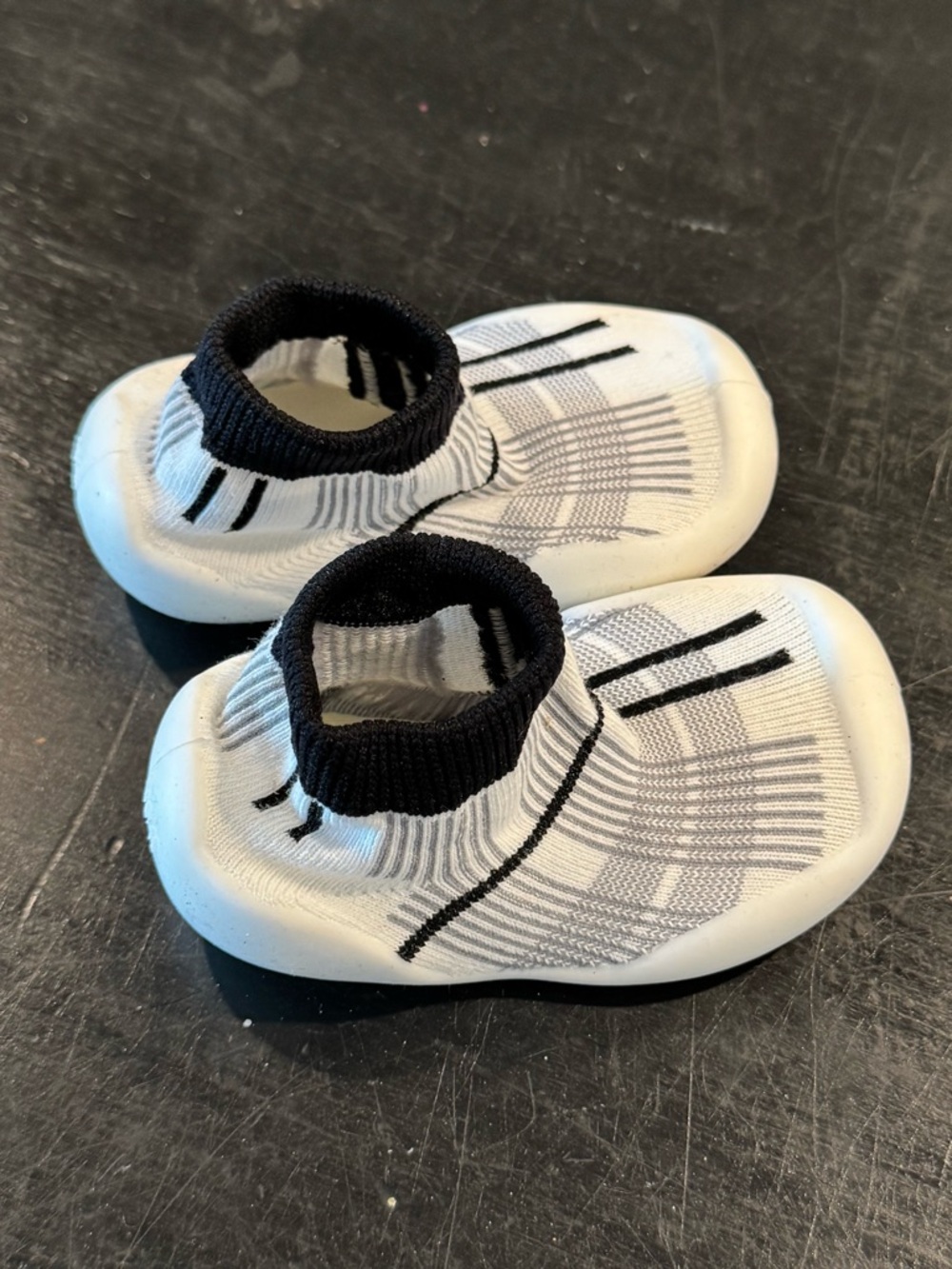 4/$15 Baby White and Black Slip-On Sock Shoes - Picture 2 of 3